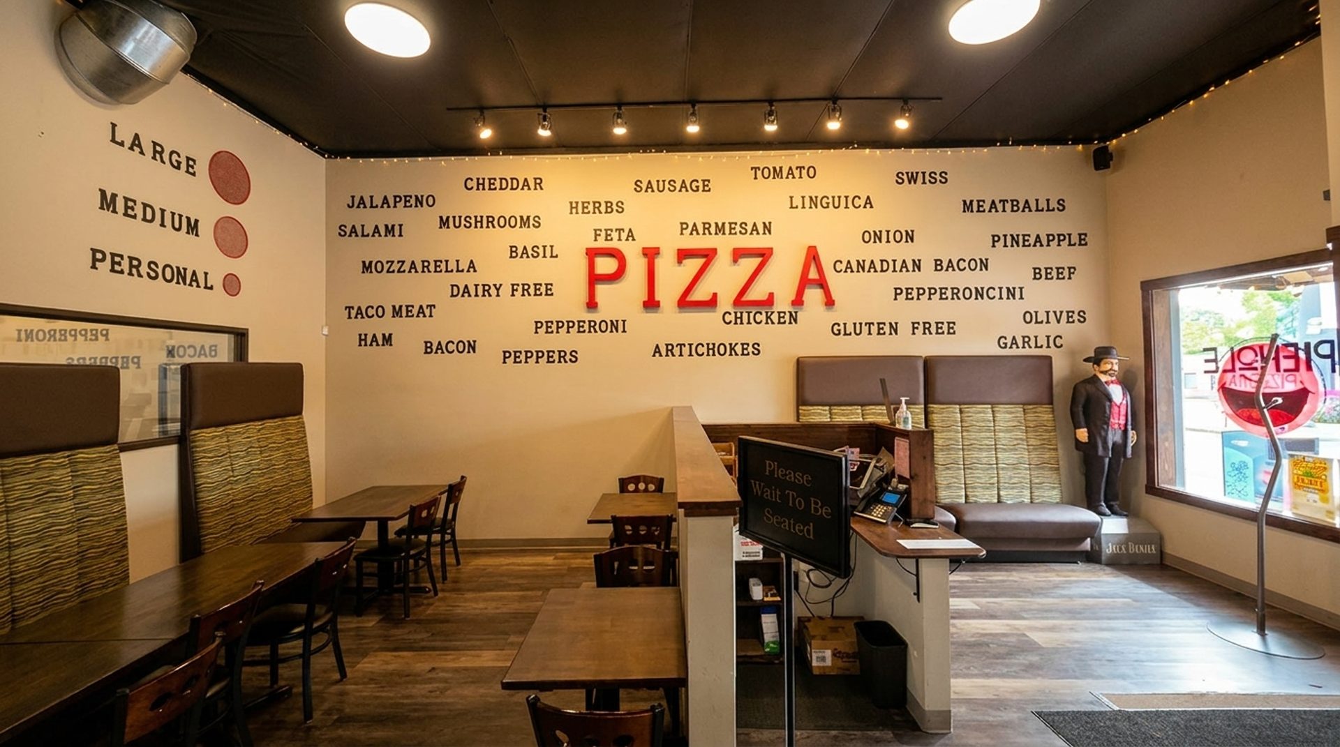 Booths, a bar, and a spot out front